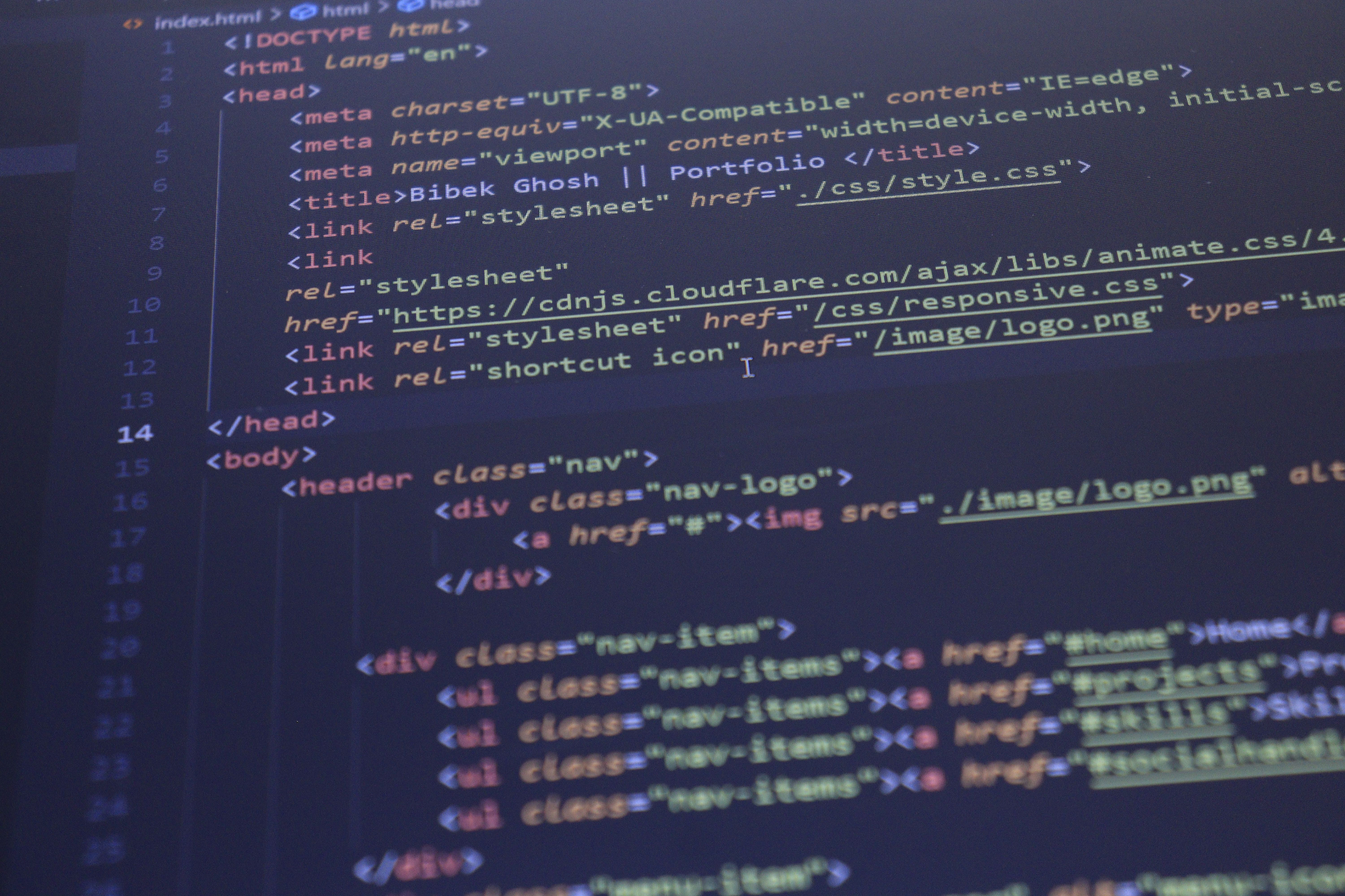 Website code open on a screen during front-end development