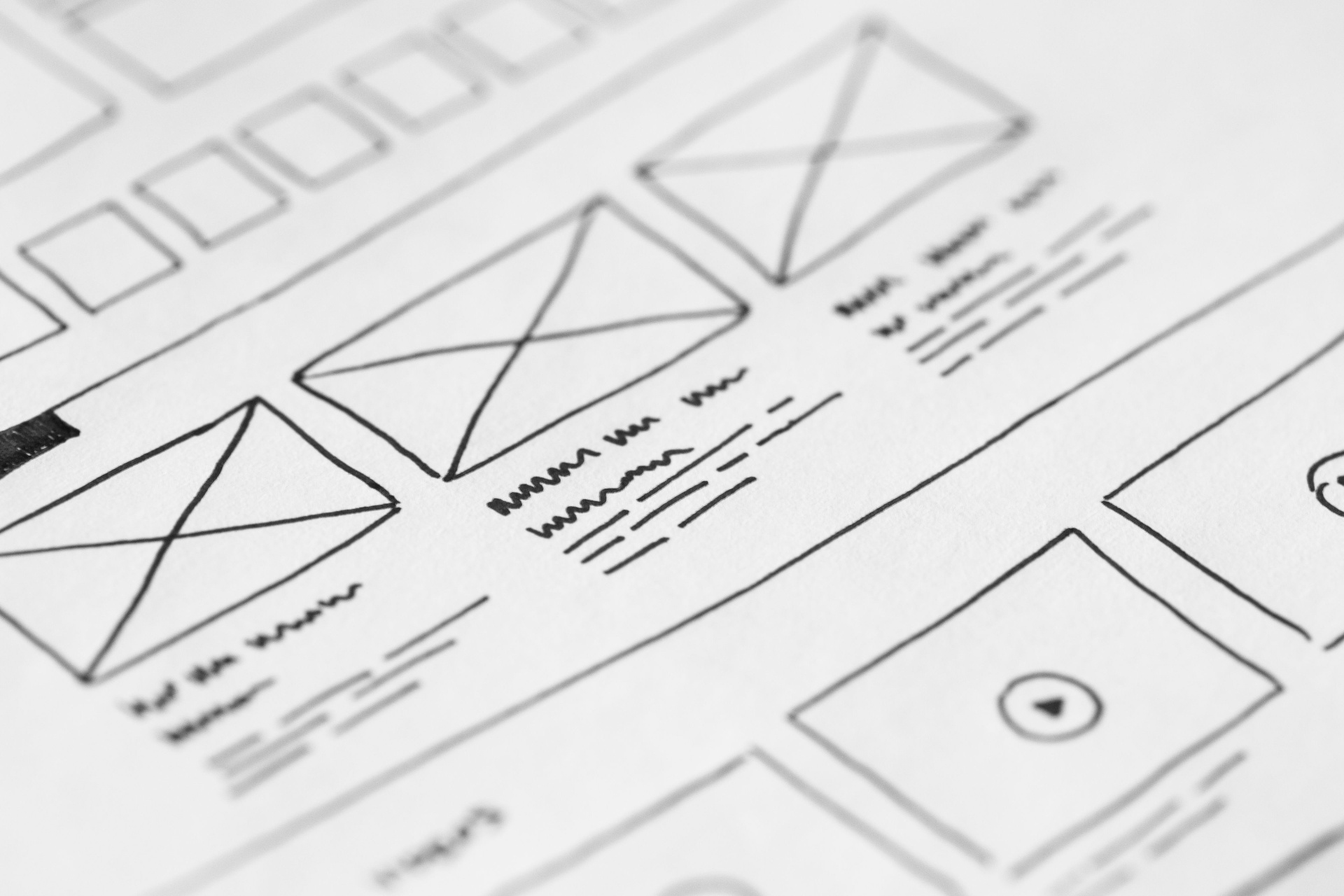 Website wireframe sketches showing page structure and layout planning